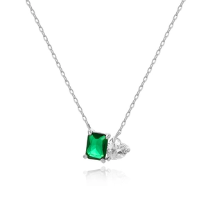 Detail of 18K gold emerald rectangle and heart zircon pendant necklace on white background