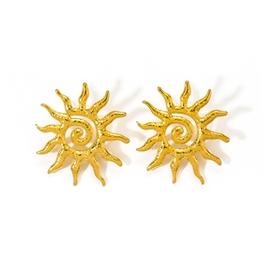 Artistic gold-tone sun-shaped earrings featuring textured spiral centers and sunburst rays