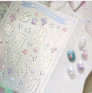 Detail of KX476 3D embossed ocean nail art stickers with seashell and wave patterns
