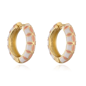 Golden flower hoop earrings with white and pink enamel petals on a reflective background