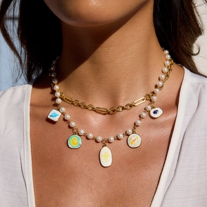 Layered 18K gold plated stainless steel necklace with pearl and planet enamel charms