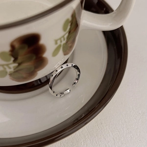 Retro 925 sterling silver open ring with continuous star patterns on a vintage cup