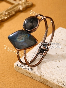 Detail view of vintage bronze cuff with labradorite and amazonite including size markings