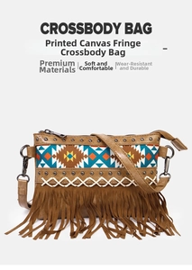 Detail of ethnic crossbody bag featuring canvas print, metallic rivets and long tassels