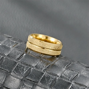 Classic gold matte titanium steel couple ring with polished center groove and frosted texture