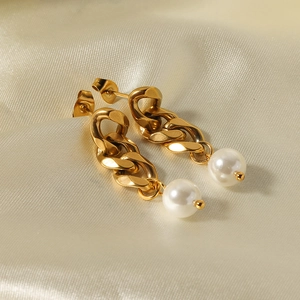 18K gold plated stainless steel chain earrings with white pearls on beige silk fabric
