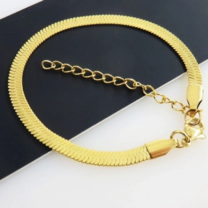 Polished gold stainless steel snake bone chain bracelet with lobster clasp and extender
