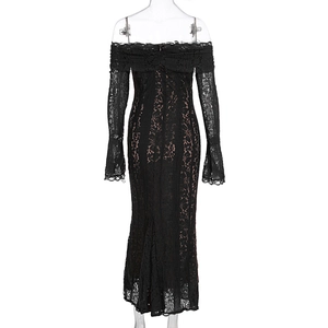 Detail of floral lace texture on off-shoulder long sleeve black evening dress