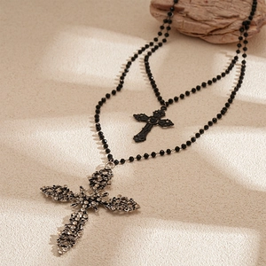Double-layered beaded cross necklace with vintage rhinestone crucifix pendant in gothic style