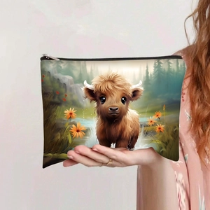 Detailed close-up of a high-capacity makeup bag featuring a cute Highland Cow illustration
