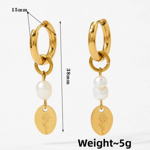 Detail view of 38mm gold-plated drop earrings featuring natural baroque pearl and rose pendant