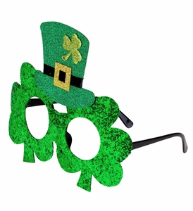 Detail of St. Patrick's Day green glitter glasses with shamrock frame and mini top hat
