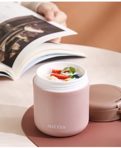 Close-up of pink 304 stainless steel soup mug with wide mouth and matte finish texture