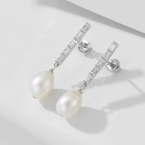Elegant 925 sterling silver drop earrings with freshwater pearls and baguette zircons