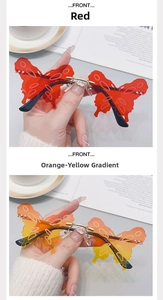 Detail of butterfly-shaped rimless sunglasses featuring metal rivets and heart bridge