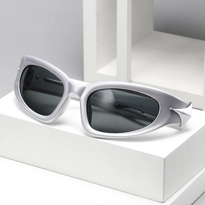 Cyberpunk Y2K futuristic sunglasses with silver matte frames and three star metal accents