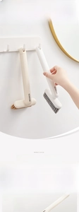 Detail of L-shaped cleaning brushes with high-density stiff bristles and hanging holes