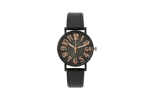 Close-up of black quartz watch face with rose gold numerals and faux leather strap