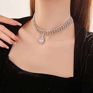 Multi-layer rhinestone choker featuring a delicate teardrop zircon pendant for women