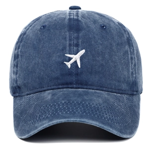 Vintage washed navy blue denim baseball cap with minimalist white aircraft embroidery