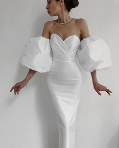 Detailed front view of white satin off-shoulder dress with puffy lantern sleeves and mermaid hem