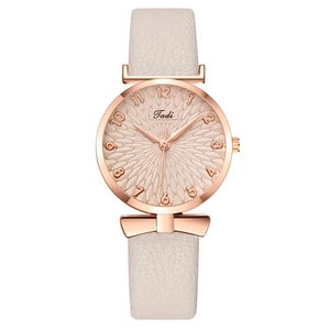 Elegant Tadi women's quartz watch with rose gold bow case and beige leather strap