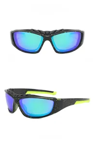 Detail view of black and green polarized cycling glasses with colorful gradient lenses