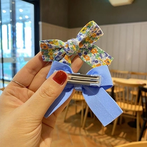 Floral print and blue fabric bow hair clips set with metal duckbill clips for girls