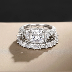 Macro shot of a 925 sterling silver bridal set featuring a large square-cut zircon ring
