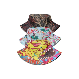 Stylish double-sided bucket hats with floral, Frida Kahlo art, and graffiti prints for women