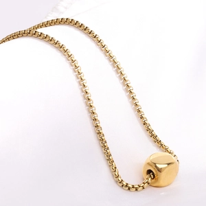 Minimalist gold tone box chain necklace with a polished 12mm square cube pendant