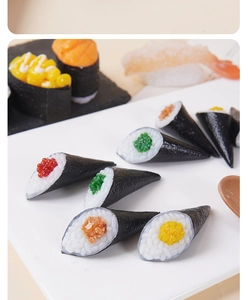 Macro detail of realistic miniature sushi hand rolls and nigiri with lifelike textures