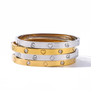 Set di 4 bracciali in acciaio inox con cuori e quadrifogli in finiture oro e argento