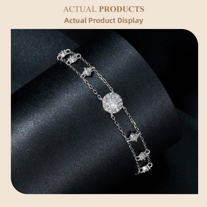 Close-up of double-layered S925 silver bracelet with sparkling moissanite stones