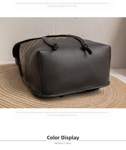 Detail view of the vintage bucket bag with genuine leather base and drawstring knot