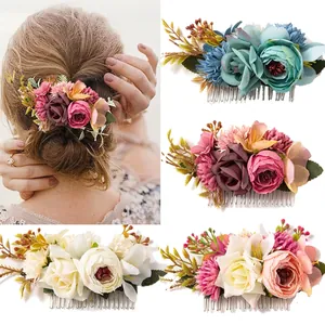 Bohemian floral hair comb with realistic fabric roses and berries for bridal styling