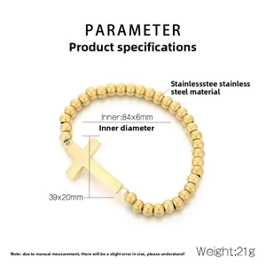 Détail d'un bracelet à billes dorées en acier inoxydable avec pendentif croix et dimensions