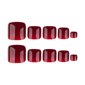 Glossy burgundy red press-on toenails set in various sizes on a clean white background