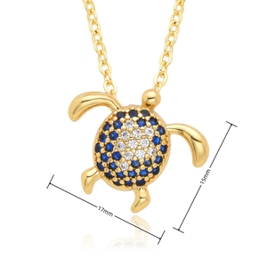 Detailed view of turtle pendant with blue zircons and dimensions of 17mm by 15mm