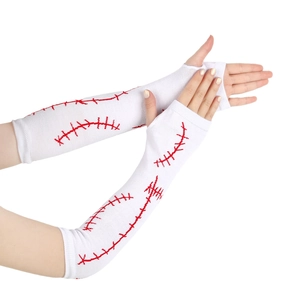 Detail of Sally stitch pattern long fingerless gloves in white knit with red embroidery