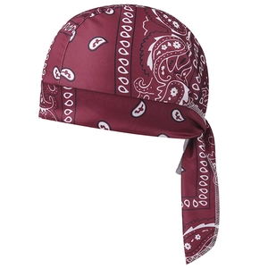 Close-up of burgundy durag with white paisley patterns and smooth satin silk texture