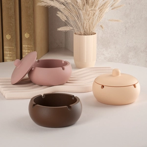 Trois moules ovales en silicone aux tons terreux pour pots de bougies et boîtes de rangement