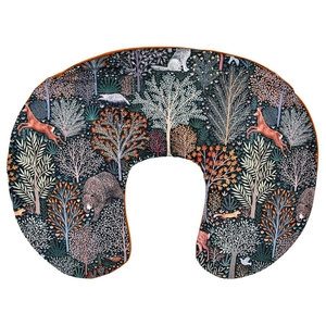 Close-up of baby nursing pillow cover with forest animal prints including deer and bears