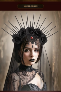 Gothic black rose crown with red center gem and long lace veil shown on a model portrait