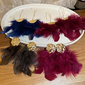 Bohemian feather earrings with hammered gold metal accents in navy blue, burgundy, and grey