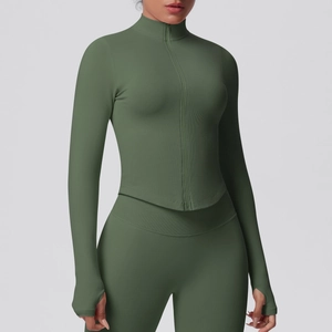Detail of olive green athletic jacket with thumbhole cuffs and ribbed knit texture