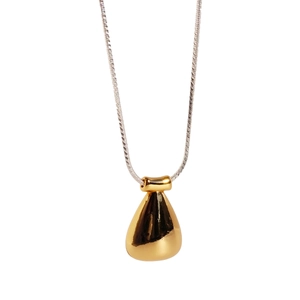 Vintage style teardrop pendant necklace with silver snake chain and gold mirror finish