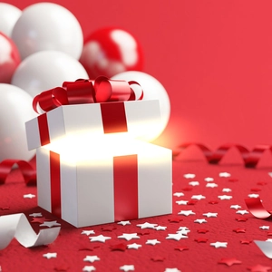 Detailed view of the 3D sleep mask luxury gift box with glowing ribbon and star confetti