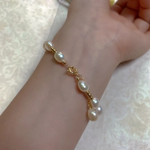 Close-up of Baroque freshwater pearl bracelet with 14K gold-filled beads and lobster clasp