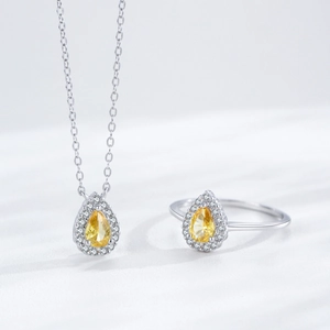 Luxurious S925 sterling silver jewelry set with pear-cut yellow zircon ring and necklace